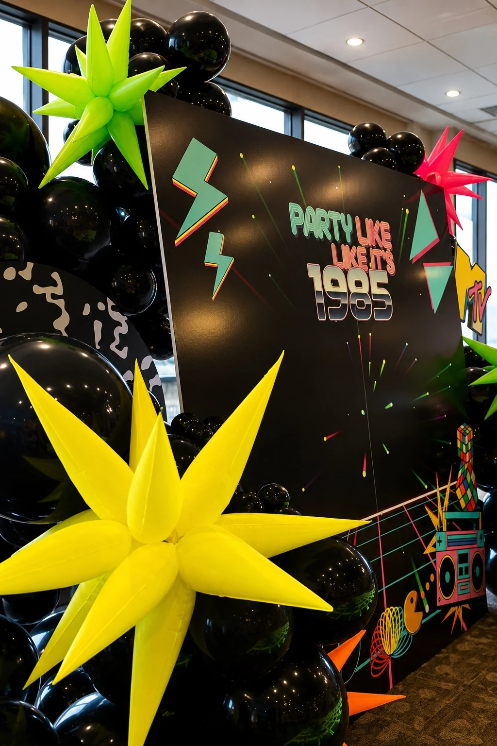 Close-up detail of the Party Like It’s 1985 backdrop