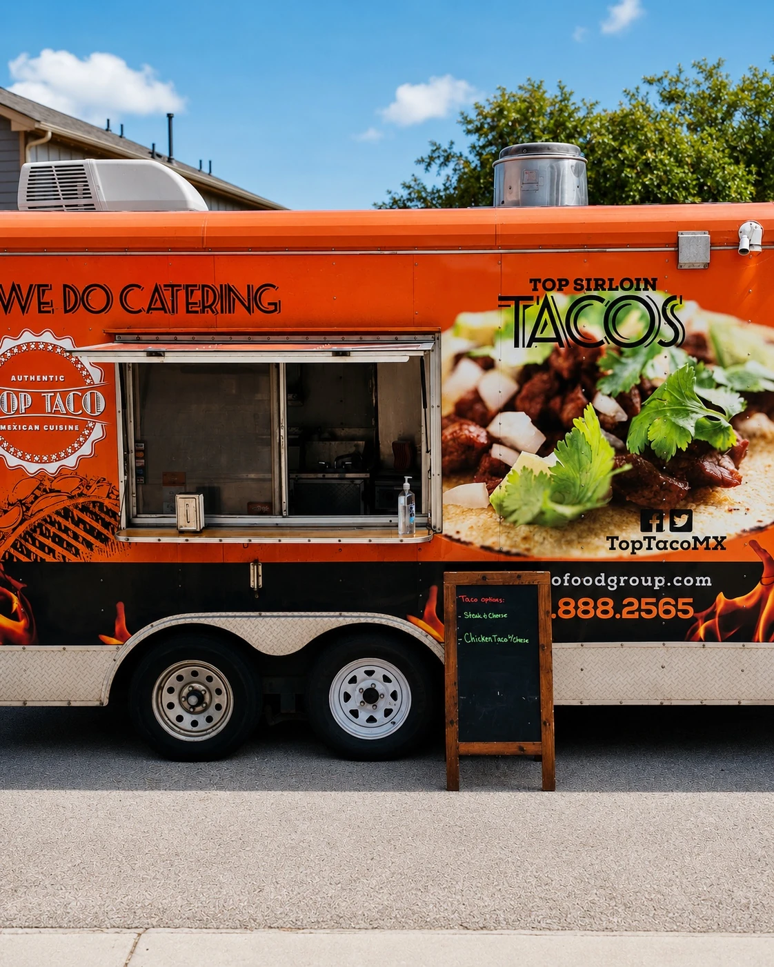 Orange taco truck catering at the event