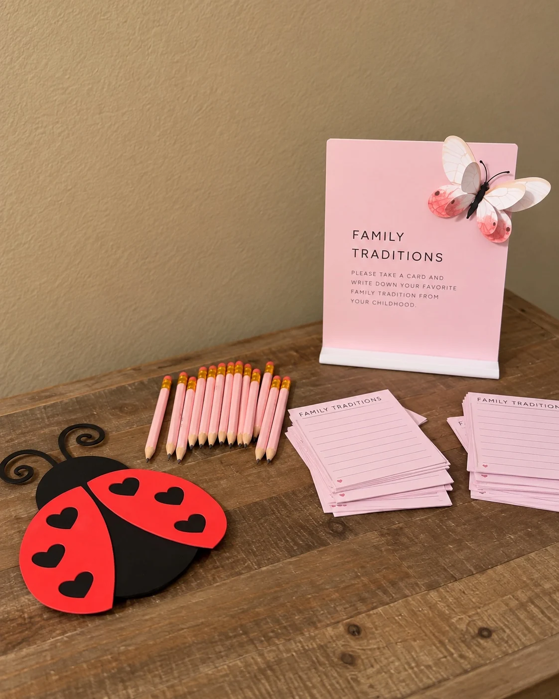 Family traditions and special moments keepsake cards with pink pencils and ladybug decor