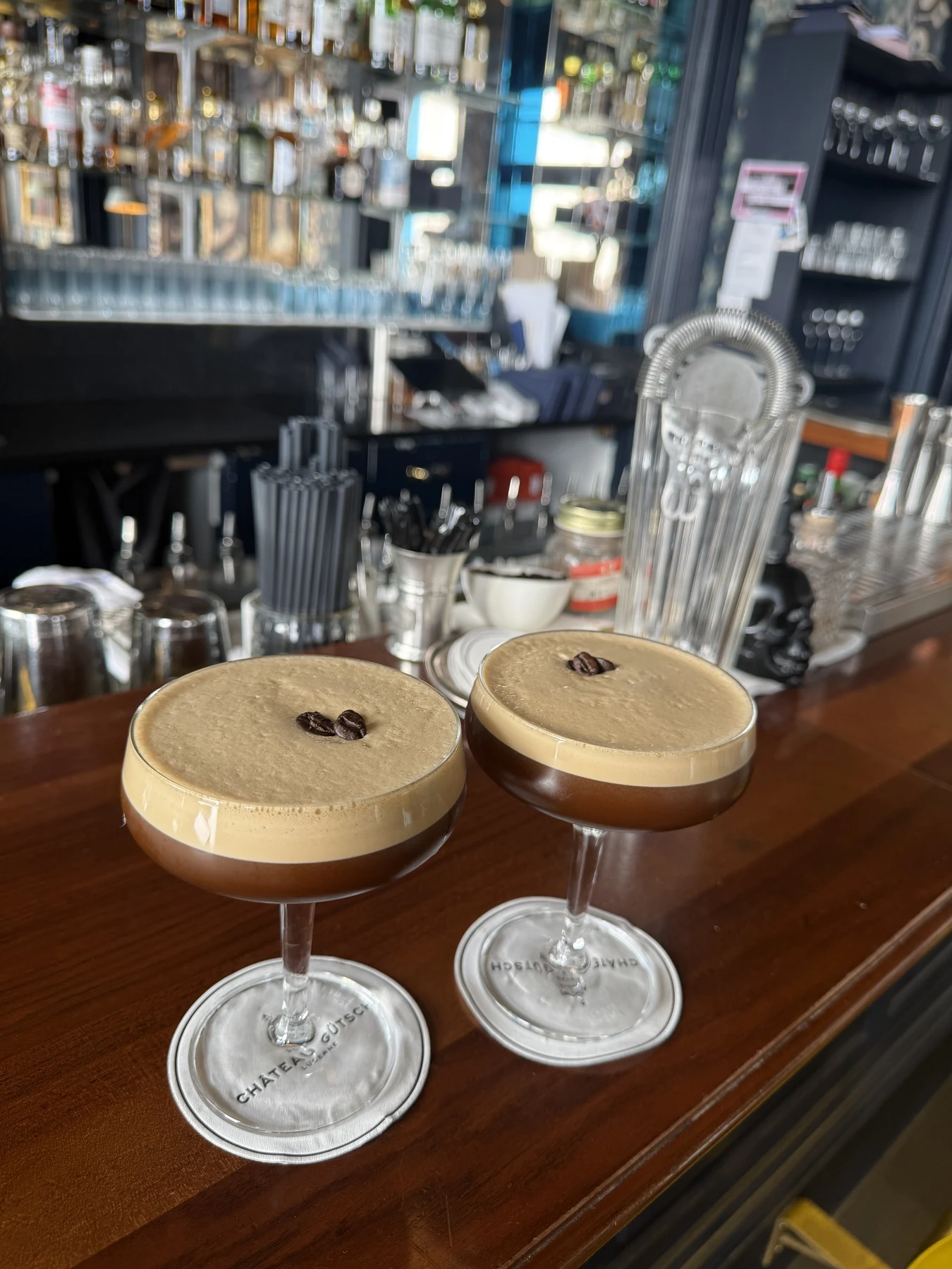 Two espresso martinis on the bar in Lucerne