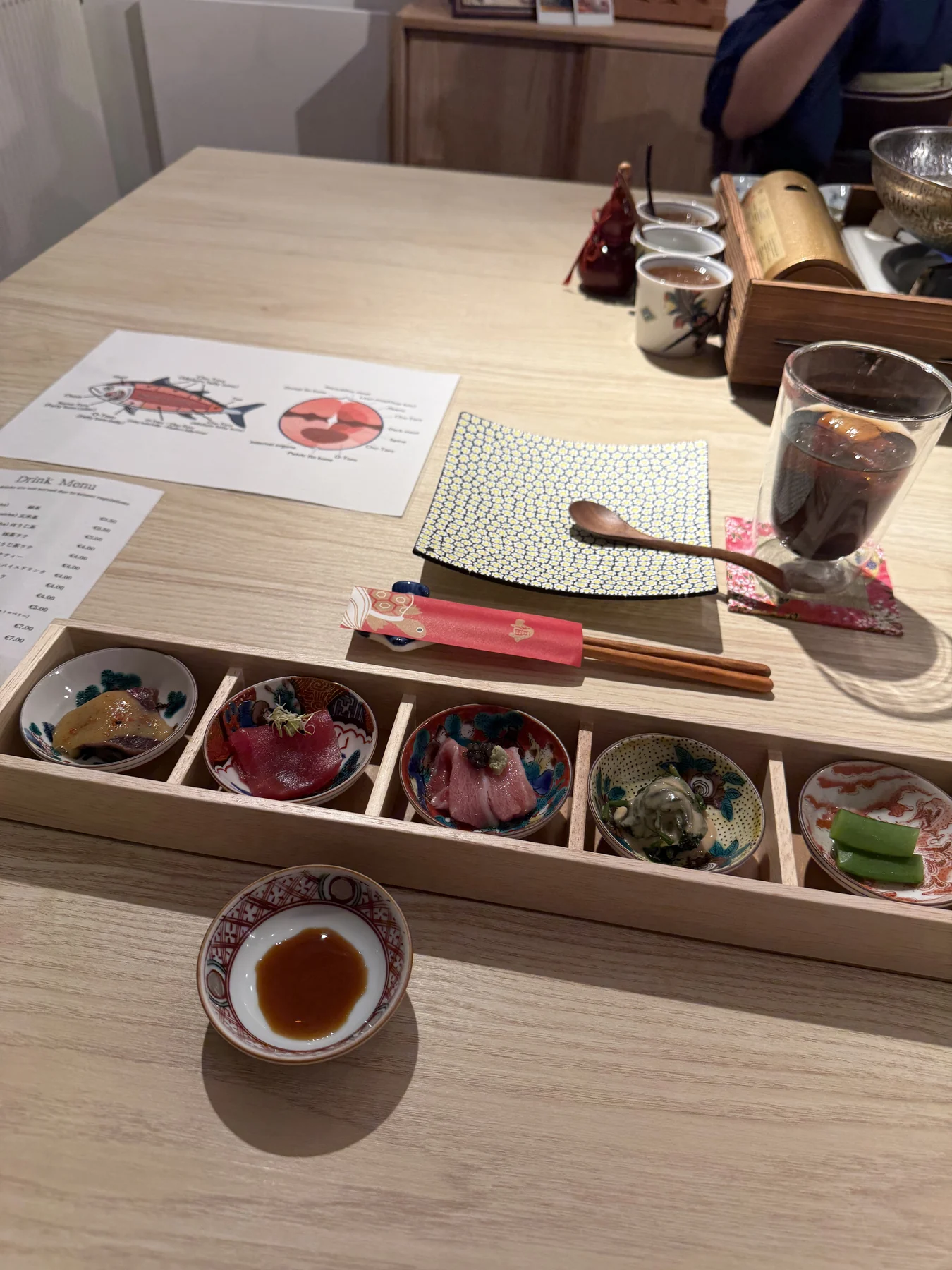 Multiple courses presented at Sushi Misaki